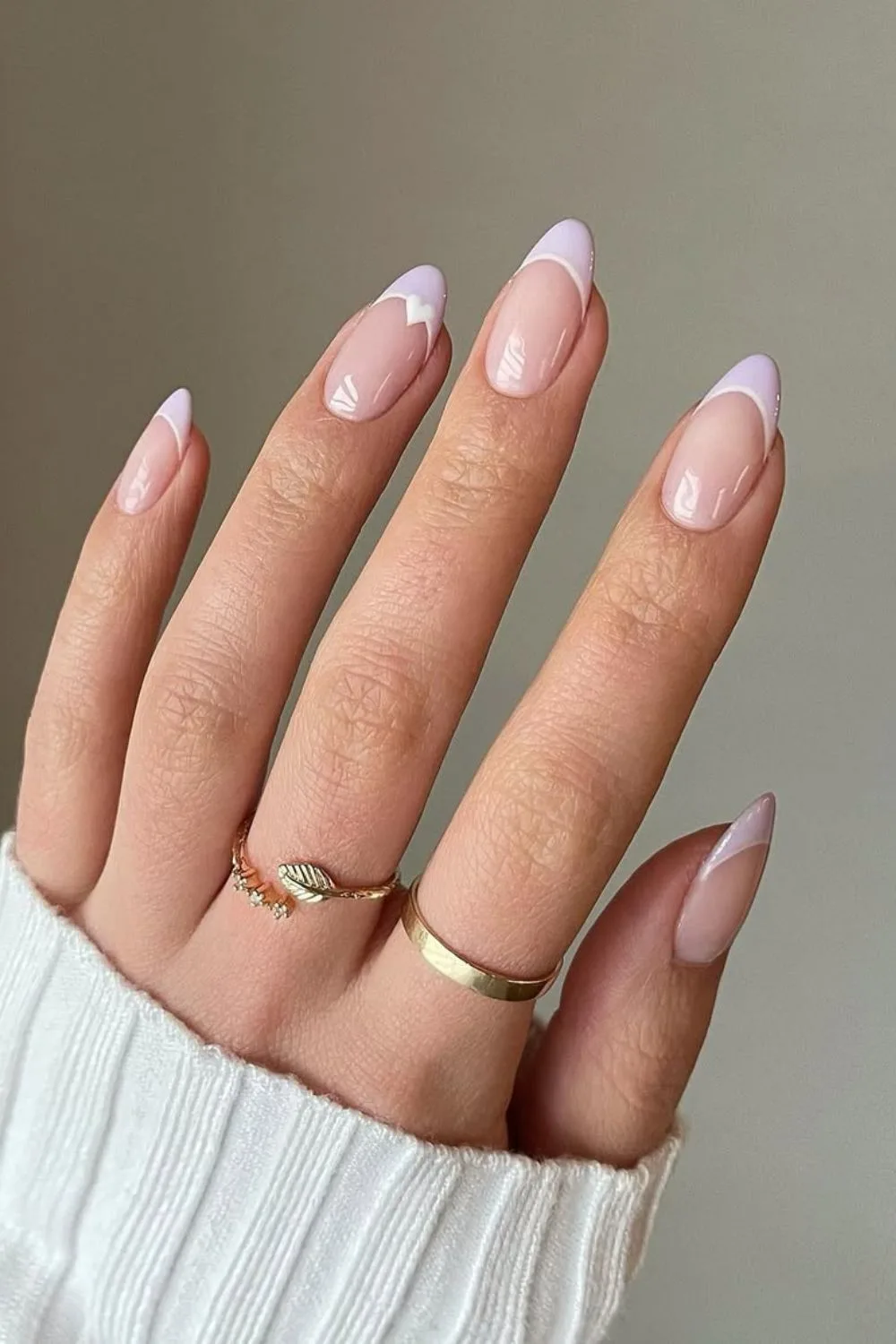 Light purple and white French tip nails with white heart accent