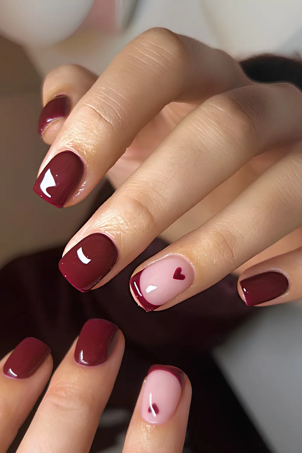 Maroon red nails with hearts