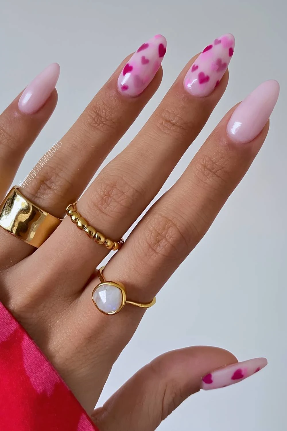 Milky pink nails with faded heart art