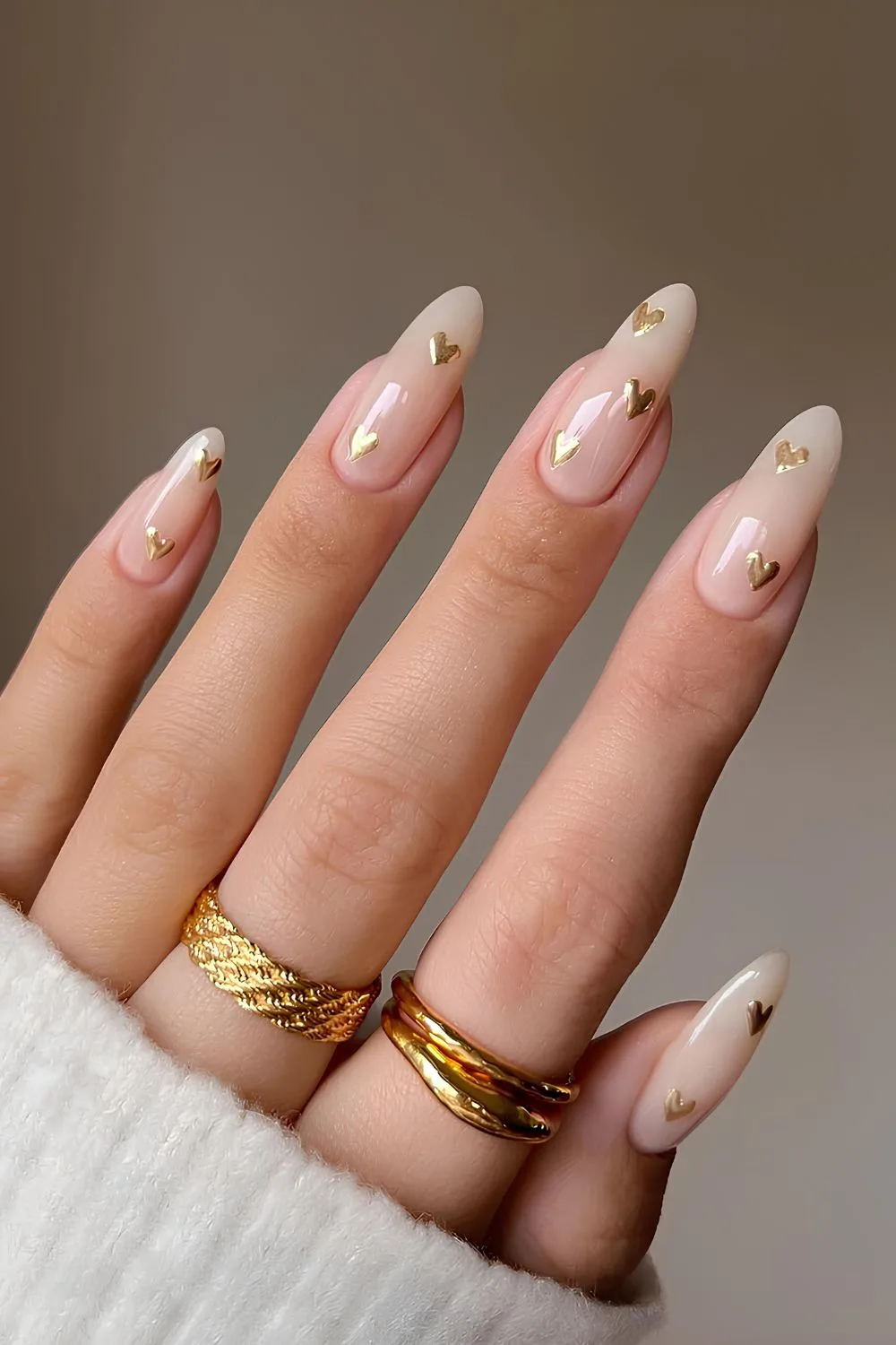 Milky white nails with gold hearts