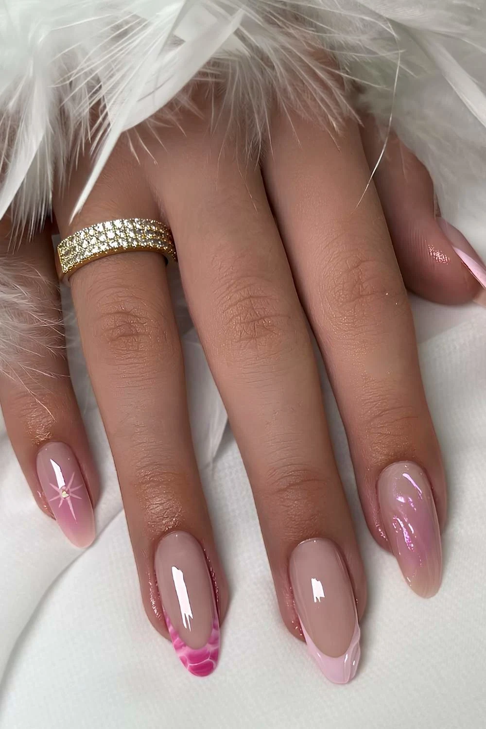 Mismatched pink French mani with 3d accents