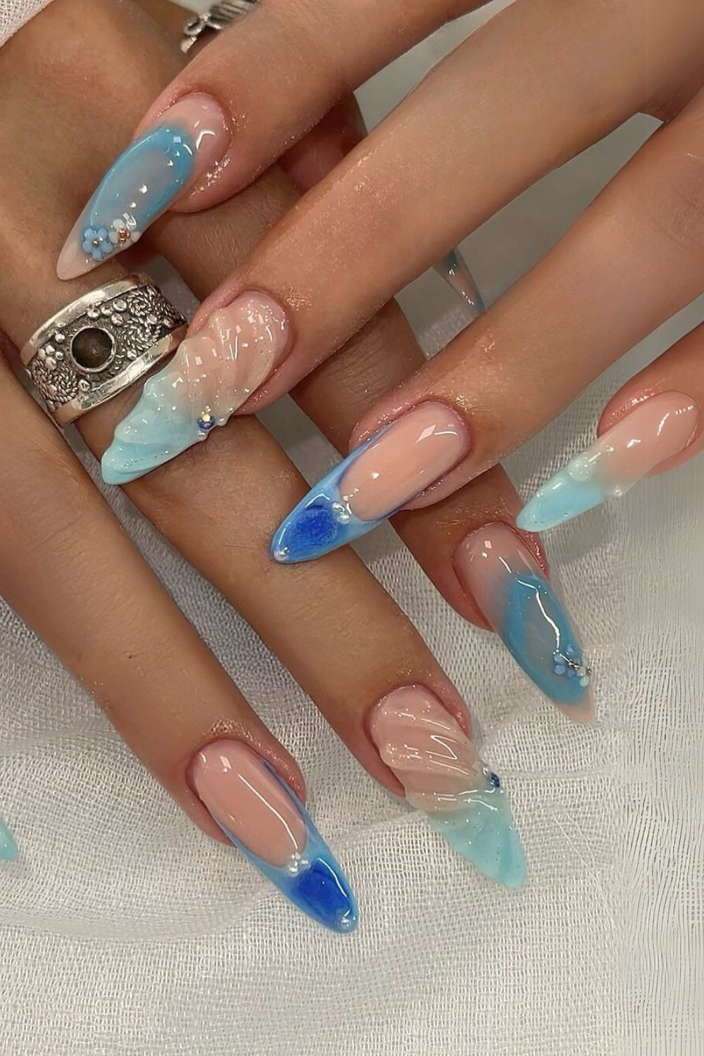 Mix and match blue French tip nails