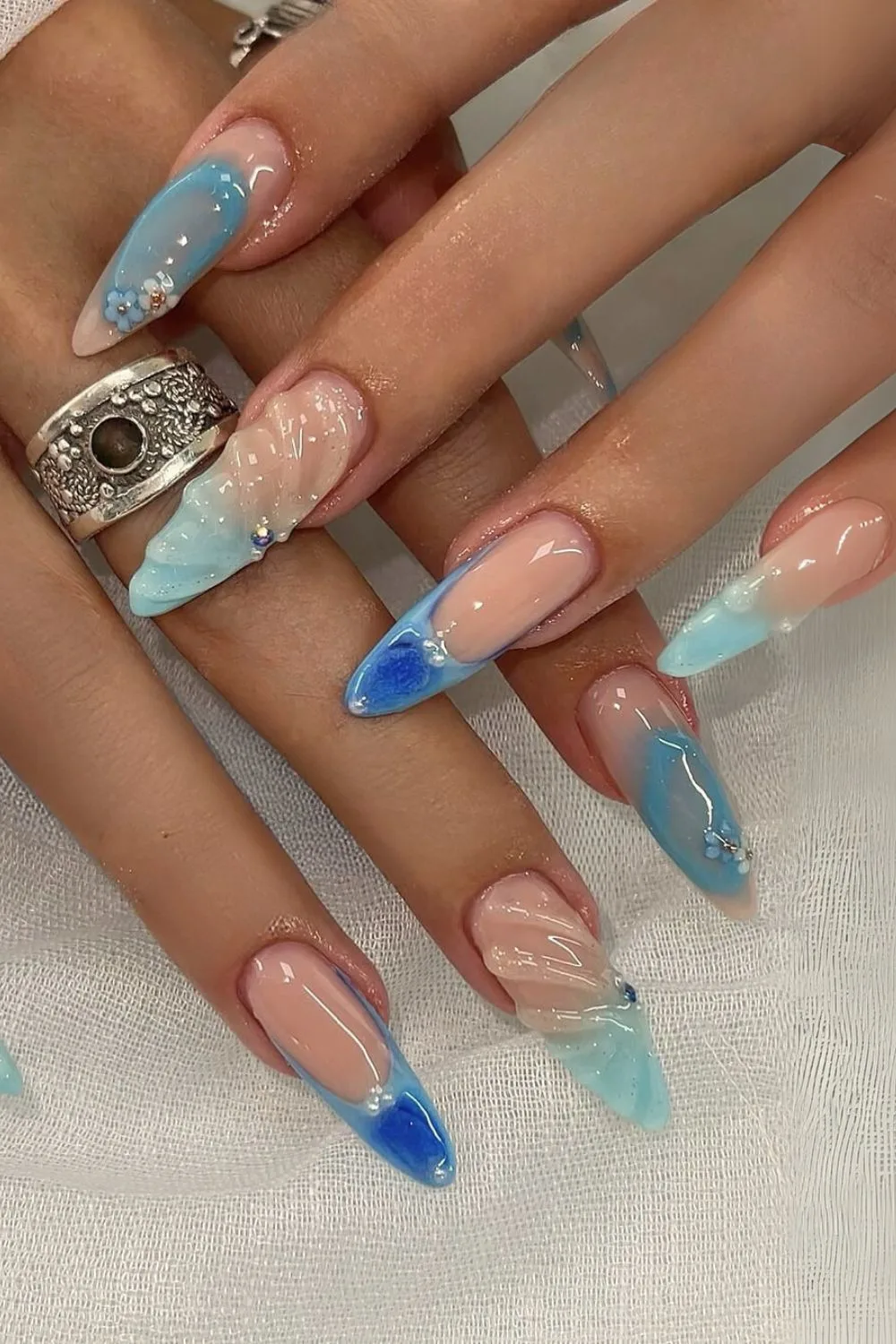 Mix and match blue French tip nails