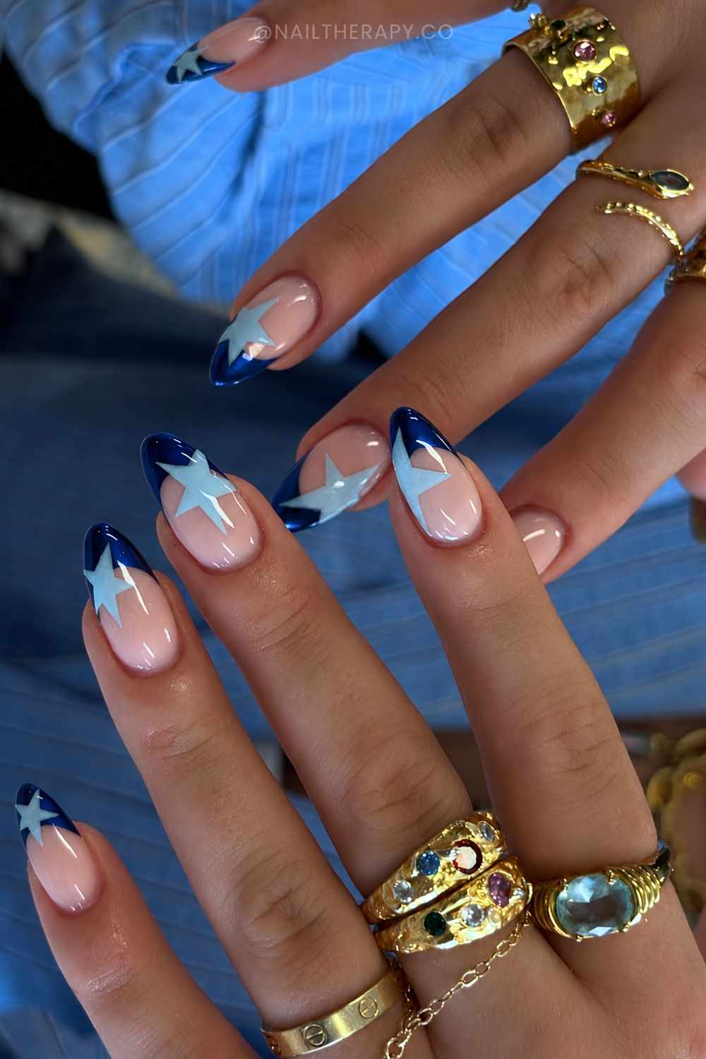 Navy French mani with baby blue stars