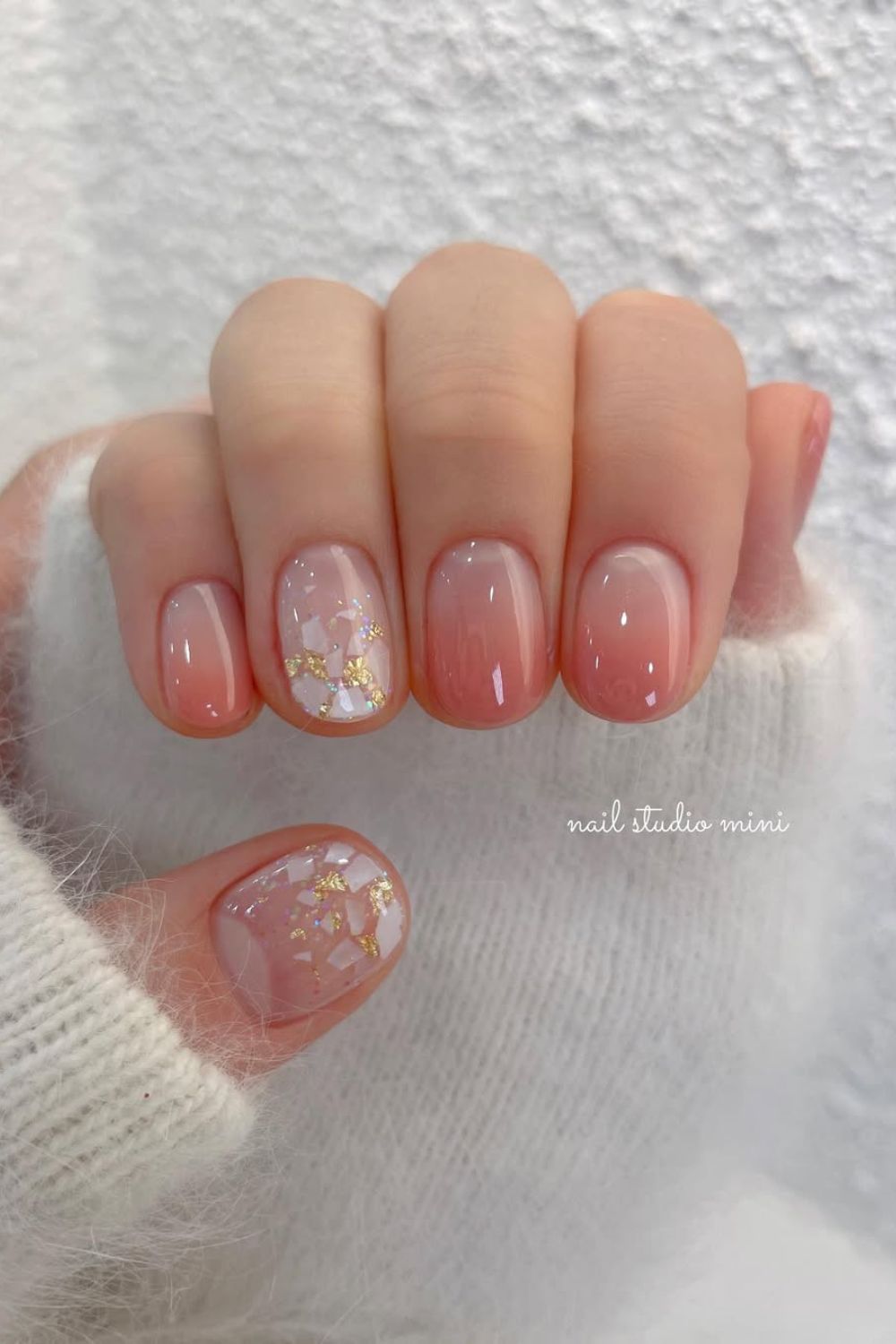 Neutral Ombre nails with gold foil accents