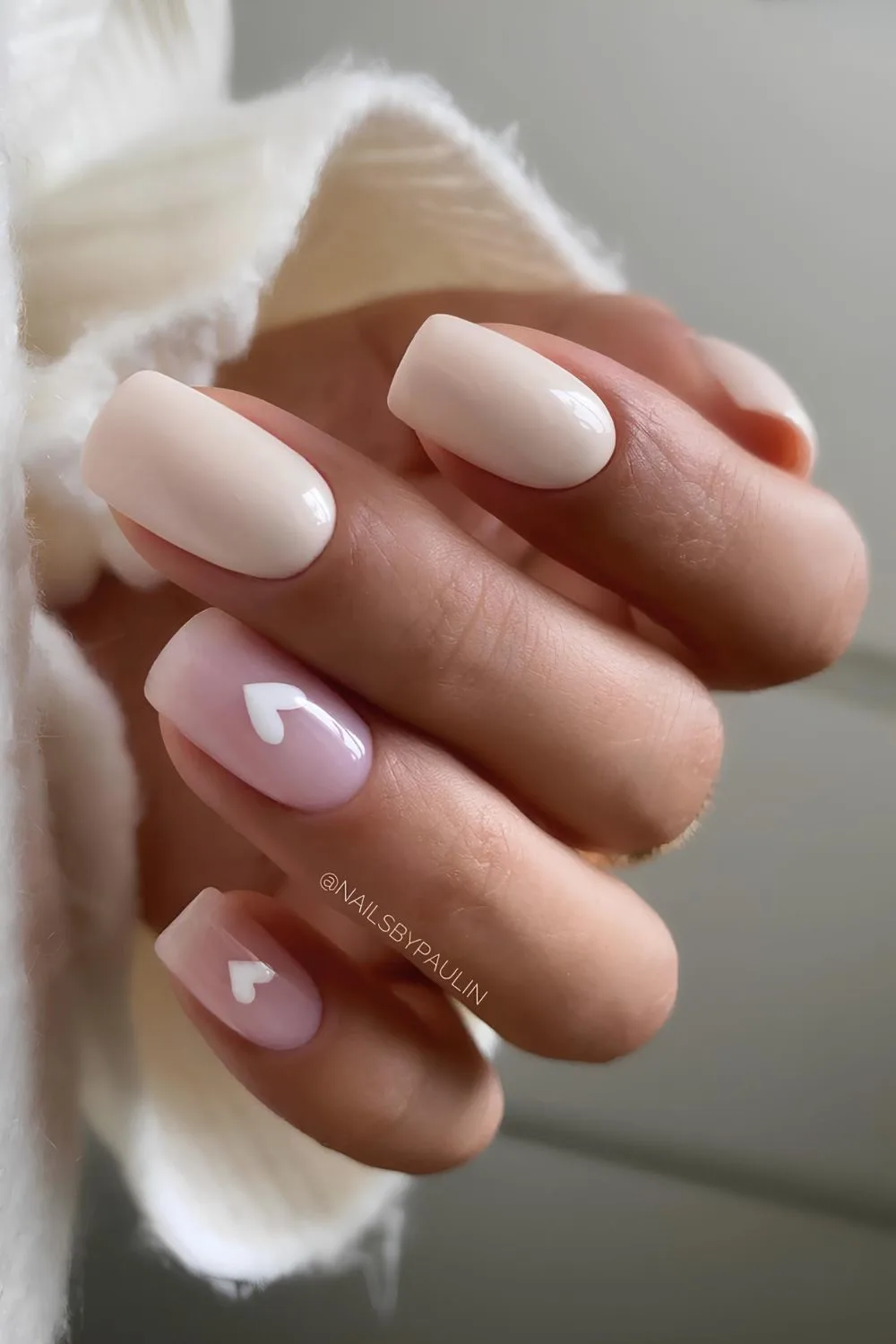 Neutral nails with heart accents