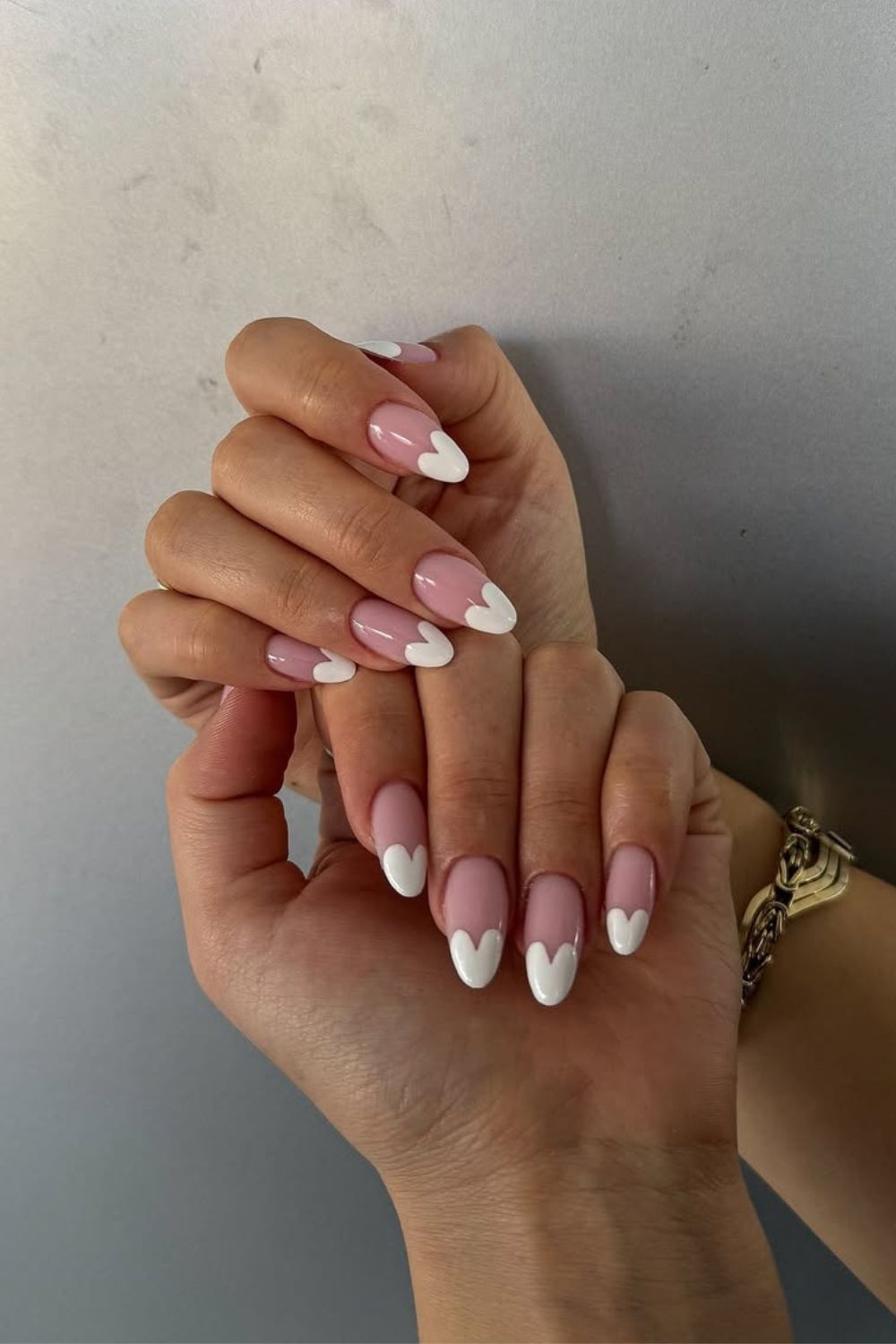 Neutral nails with white sweetheart tips