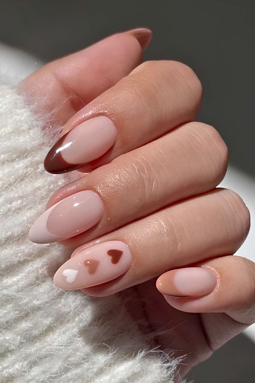 Neutral skittle French nails with hearts