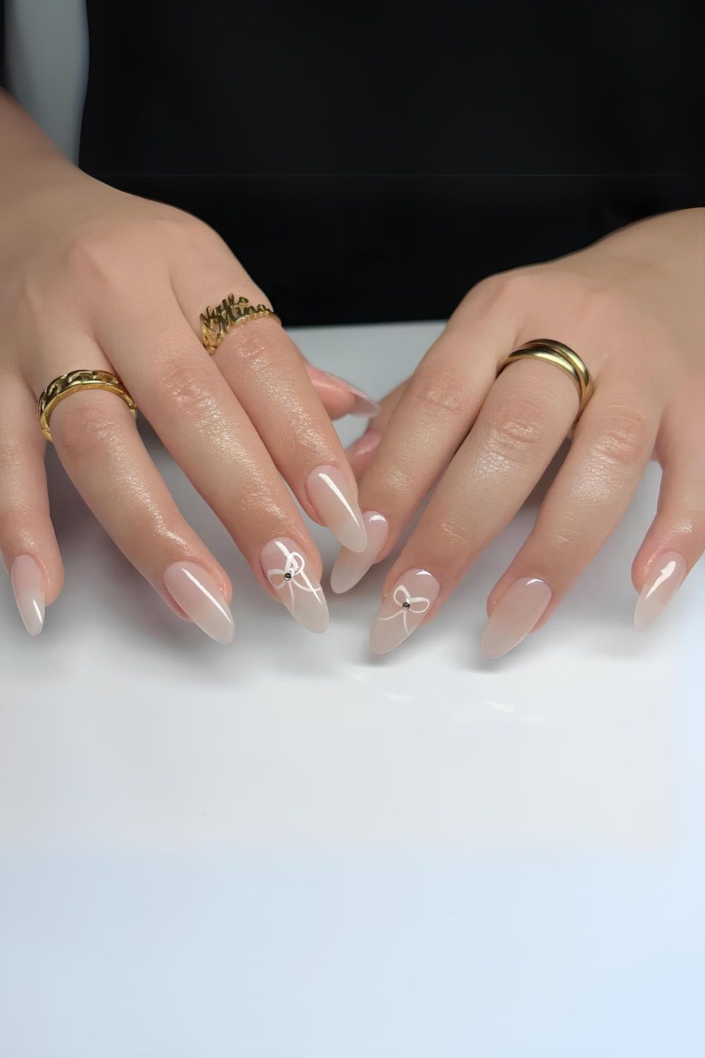 Neutral white nails with white bows