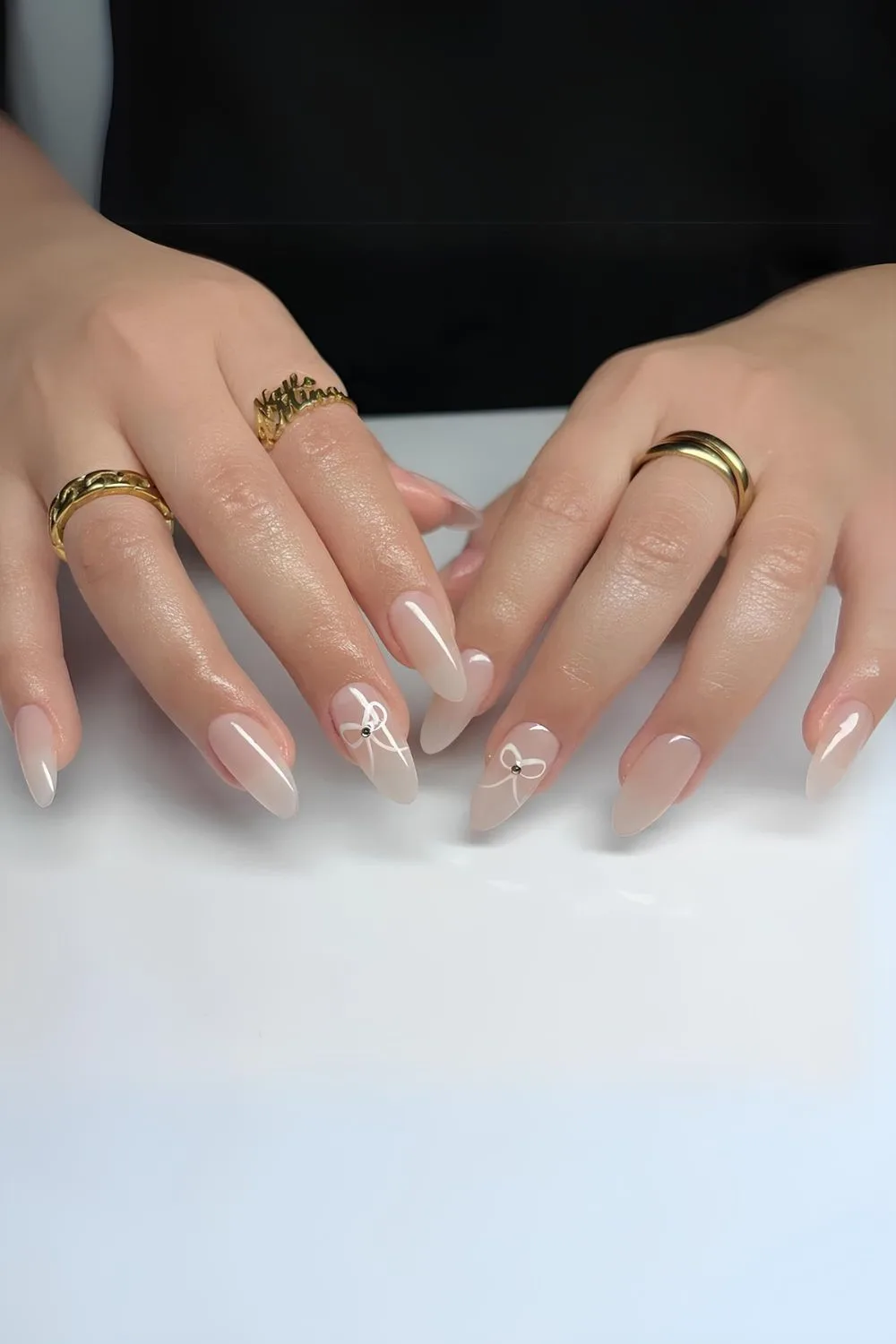 Neutral white nails with white bows