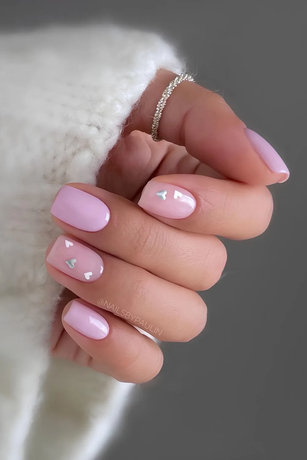 Pastel pink mani with silver and white hearts