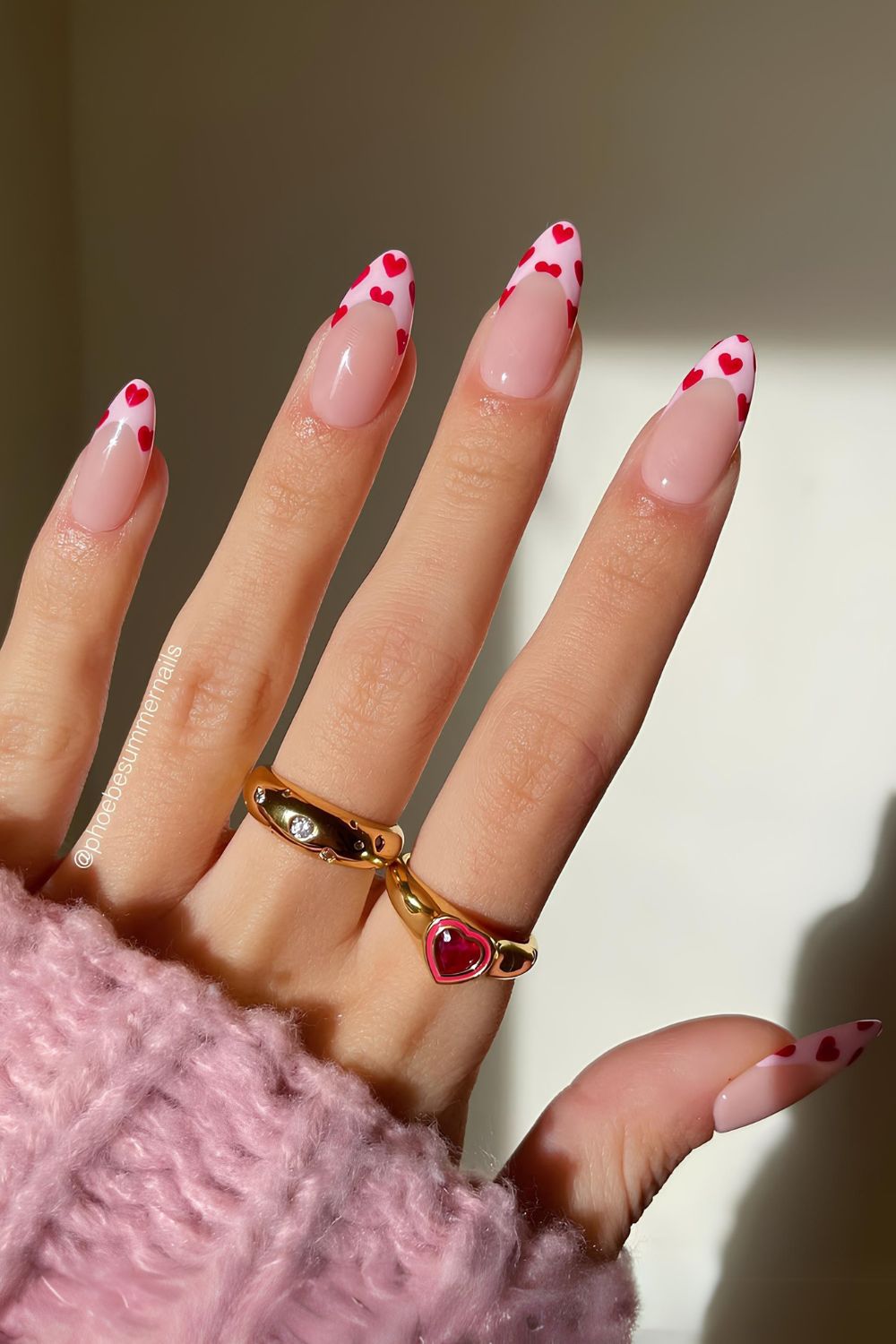 Pink French mani with red hearts