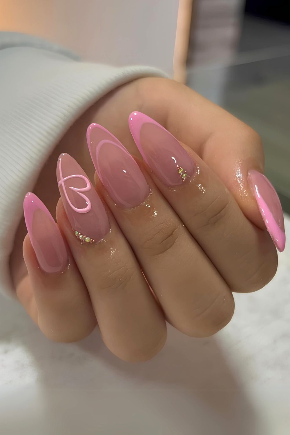 Pink French nails with heart outline