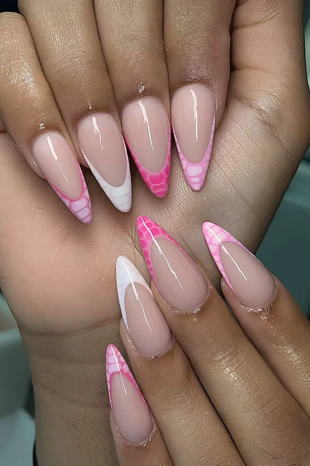 Pink French tip nails in animal print