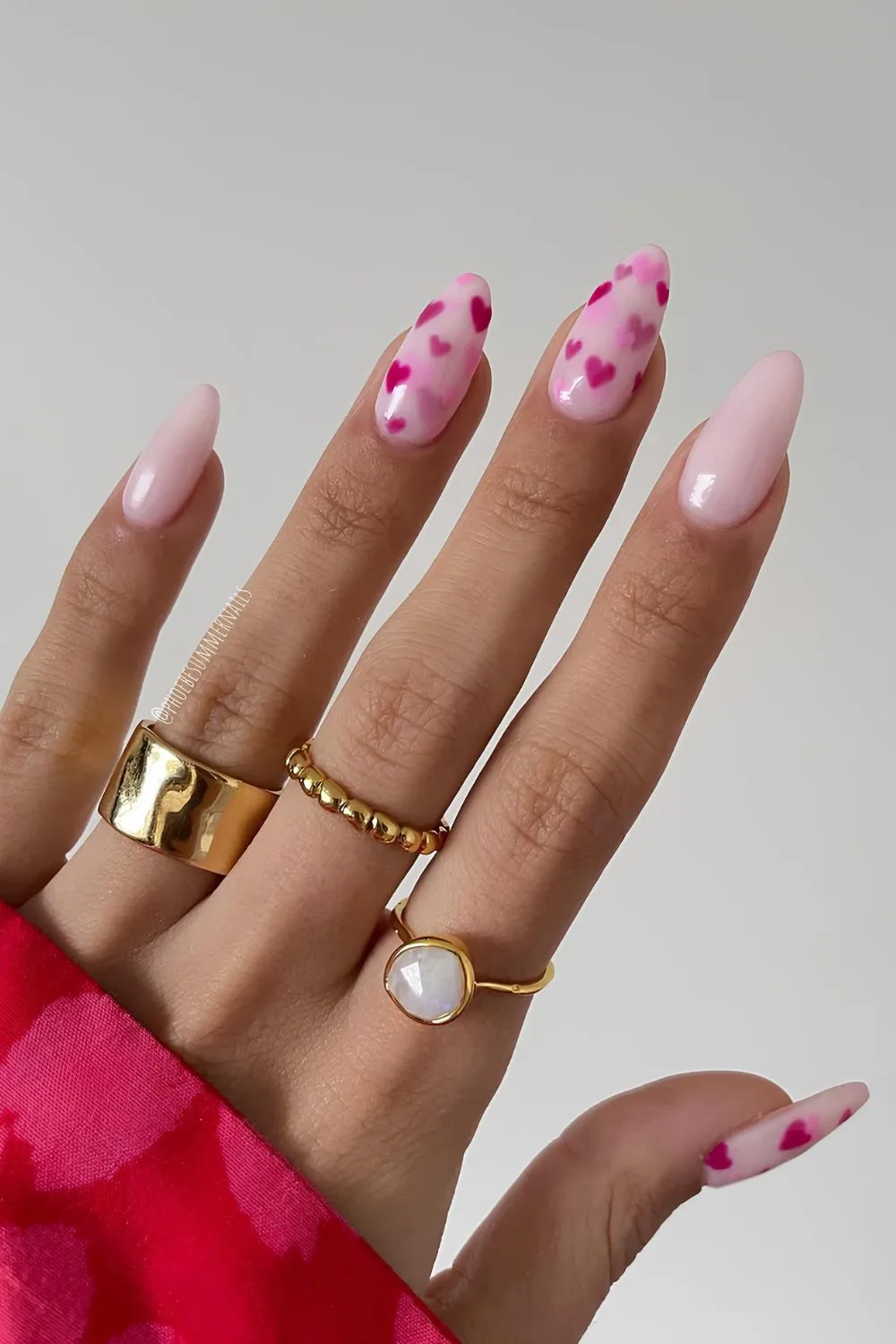 Pink Valentine nails with faded hearts