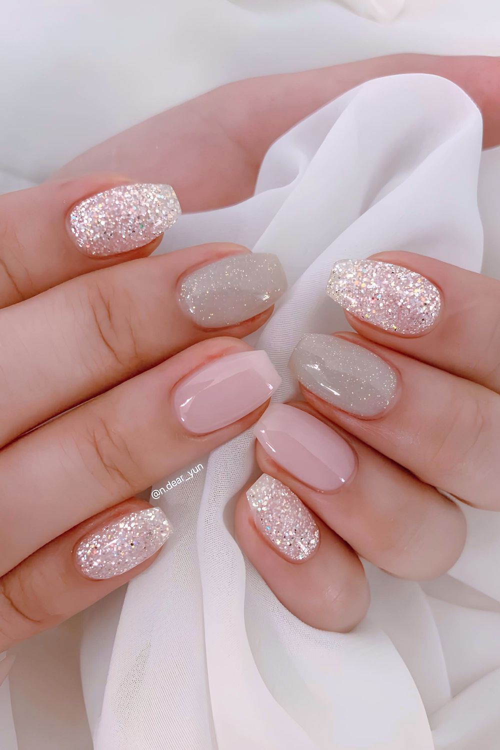 Pink and gray nails with glitter