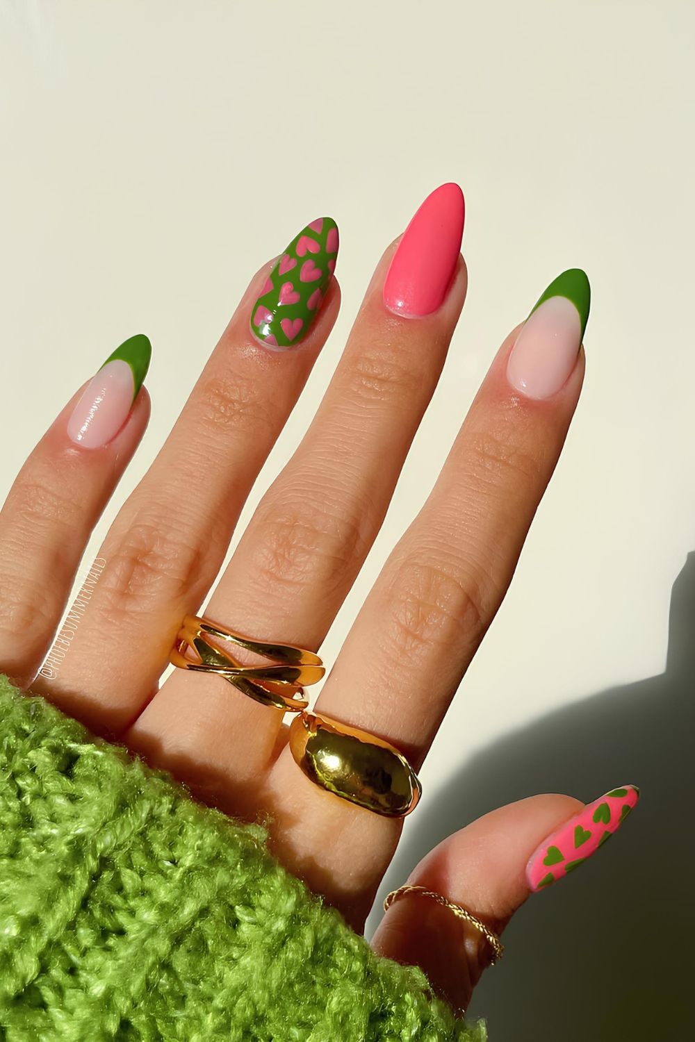 Pink and green nails with heart accents