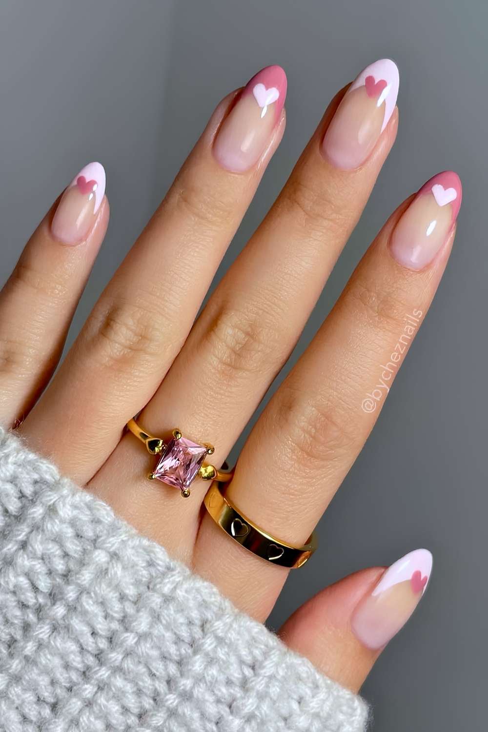 Pink and mauve French nails with hearts