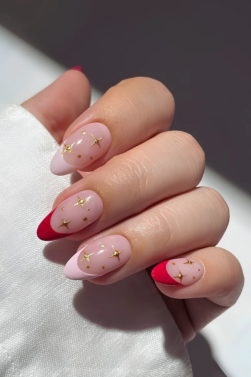 Pink and red celestial French nails