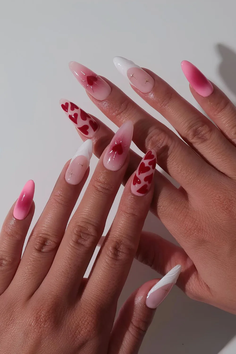 Pink and red mani with hearts and aura effect