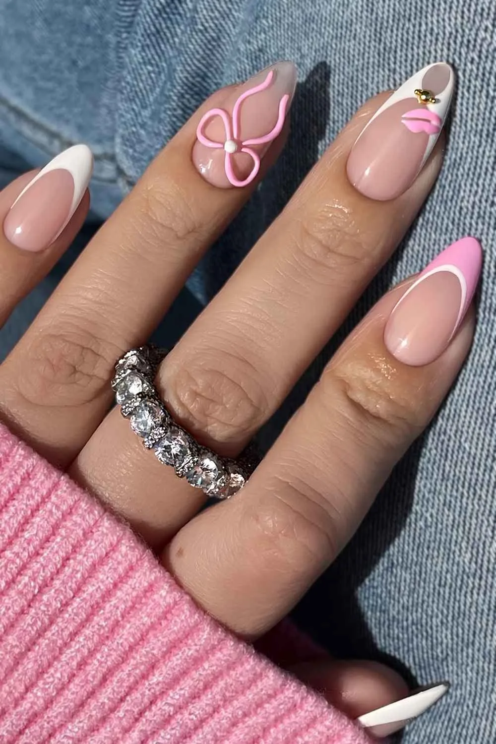 Pink and white coquette French nails with bows
