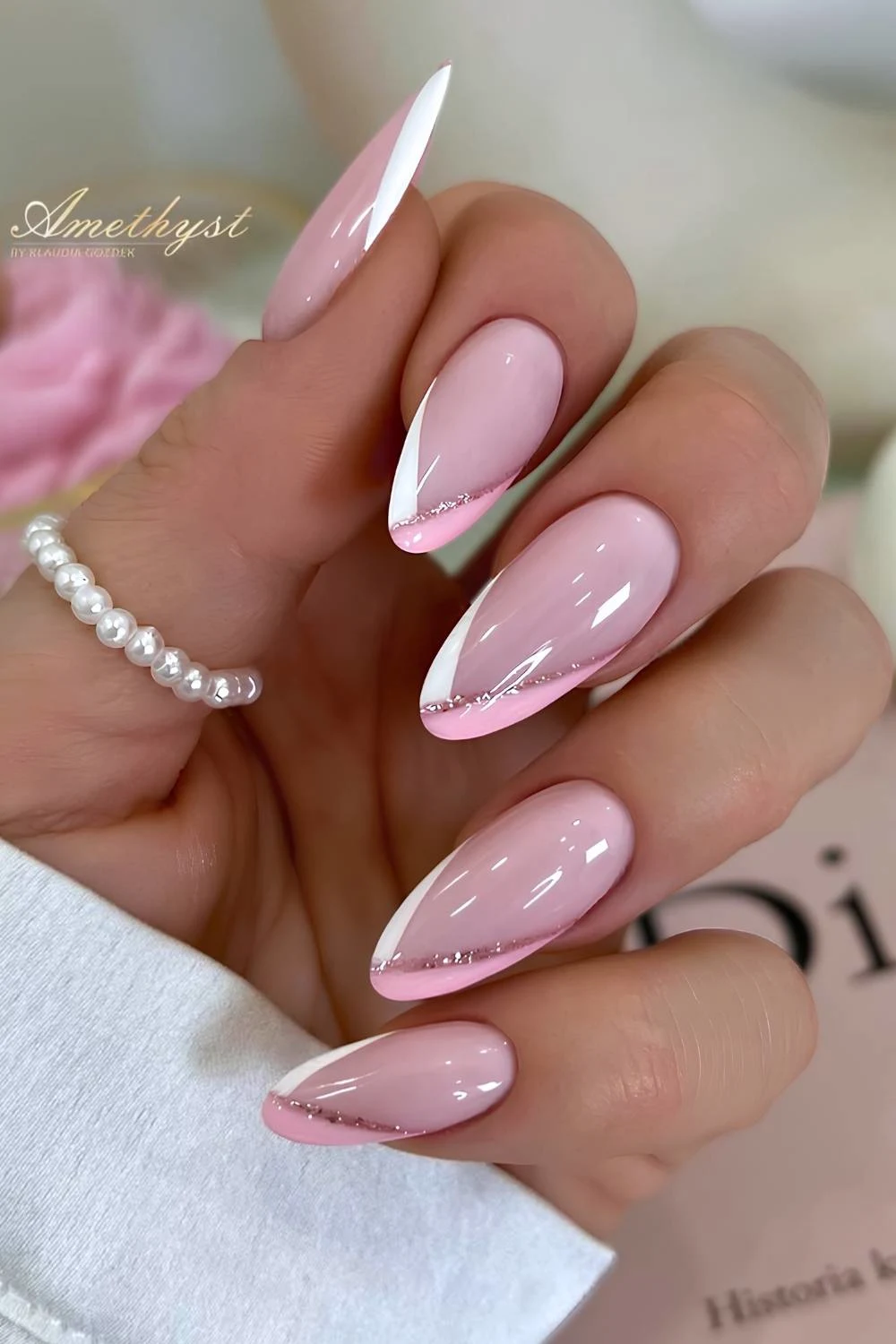 Pink and white v shaped French nails