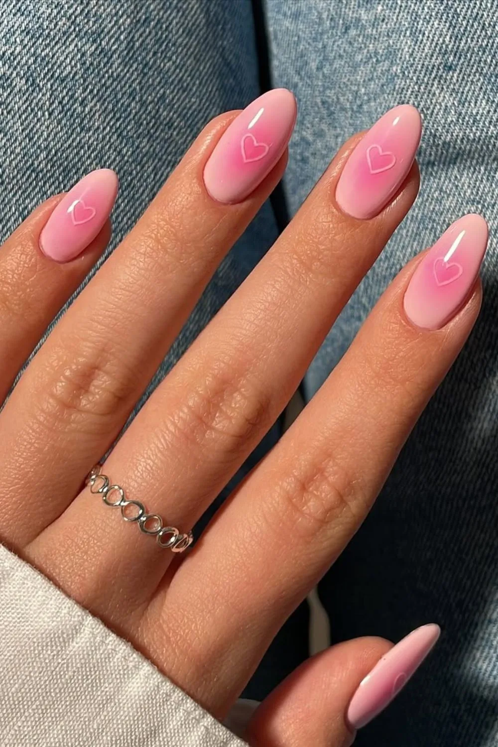 Pink aura nails with heart accents