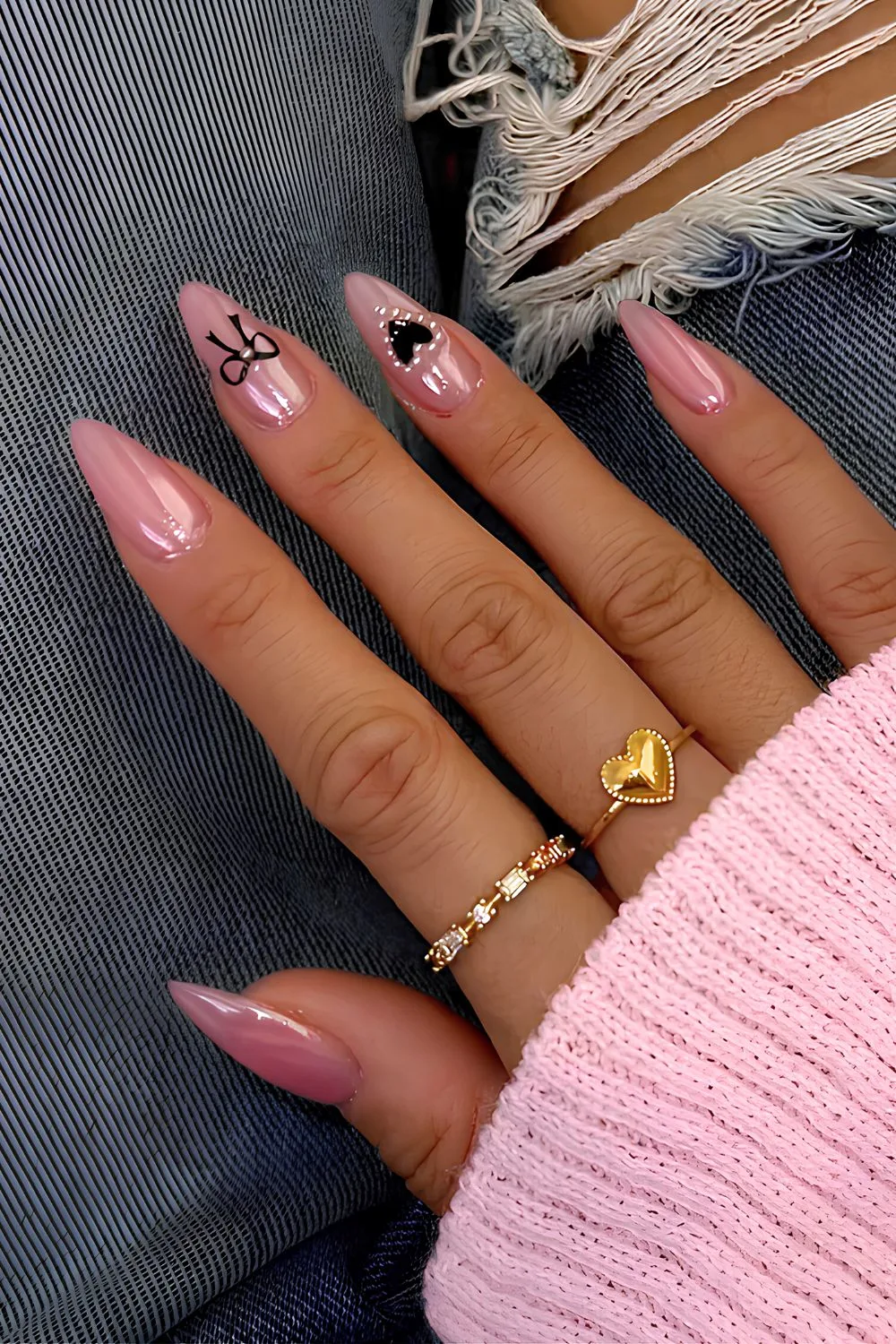 Pink chrome nails with bows and pearls