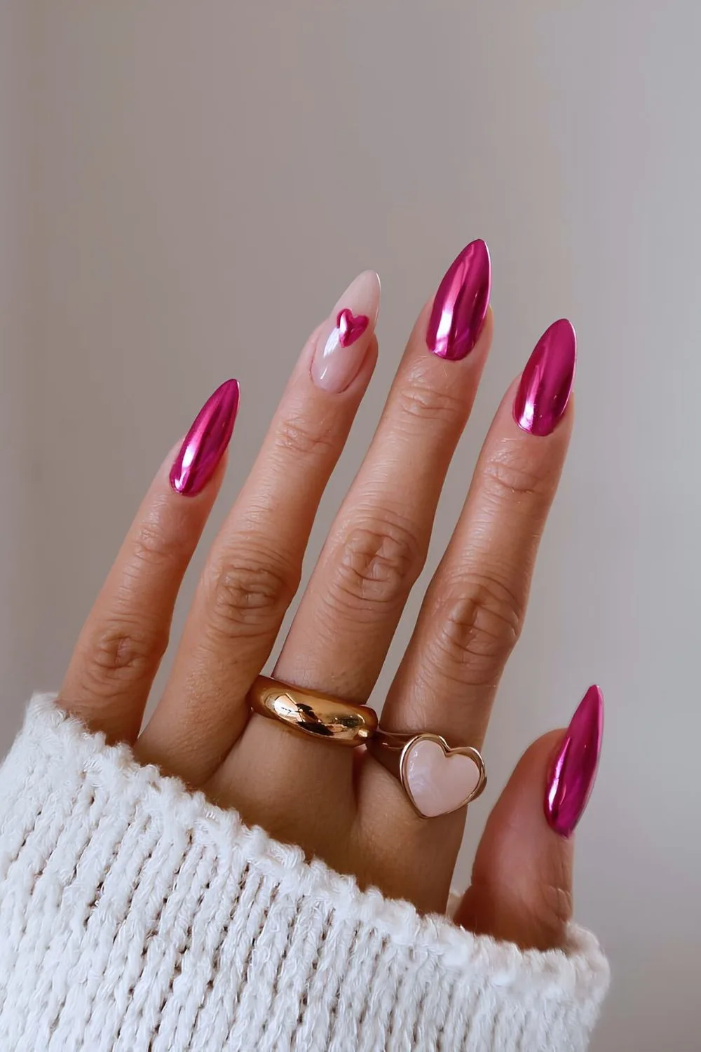 Pink chrome nails with heart accent