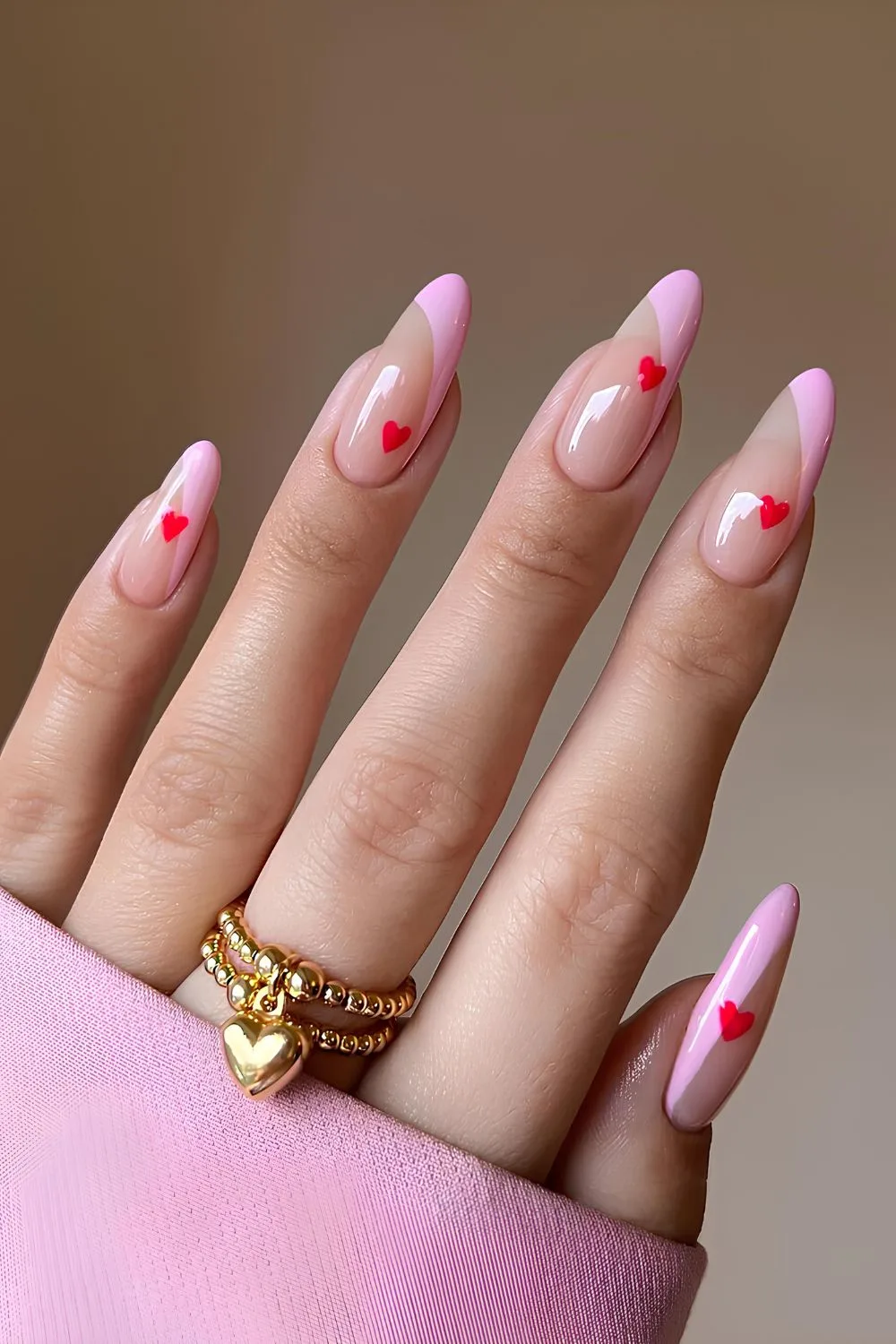 Pink side French tip nails with hearts