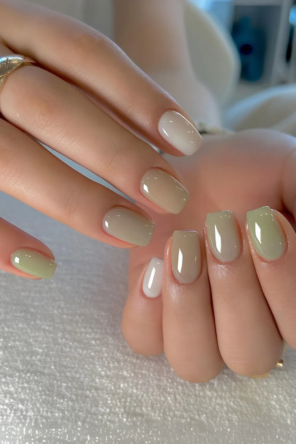 Pistachio green nails with white accents