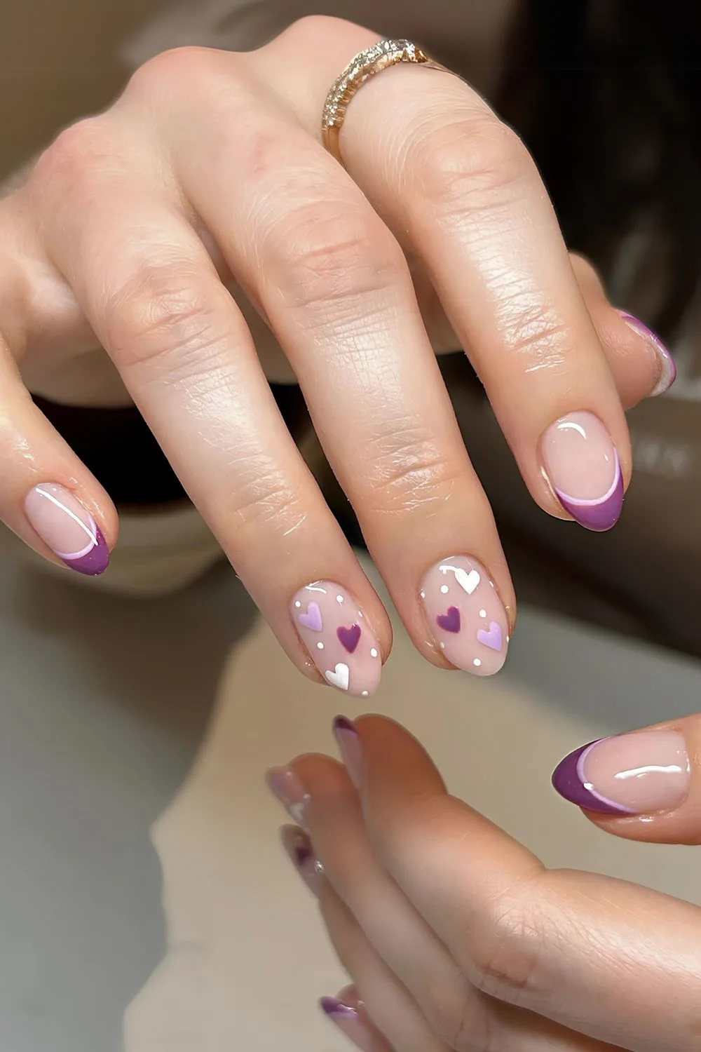 Purple Valentine French nails with hearts