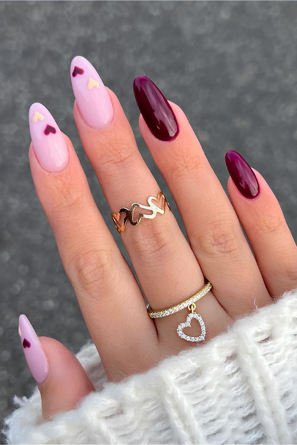 Purple nails with heart accents