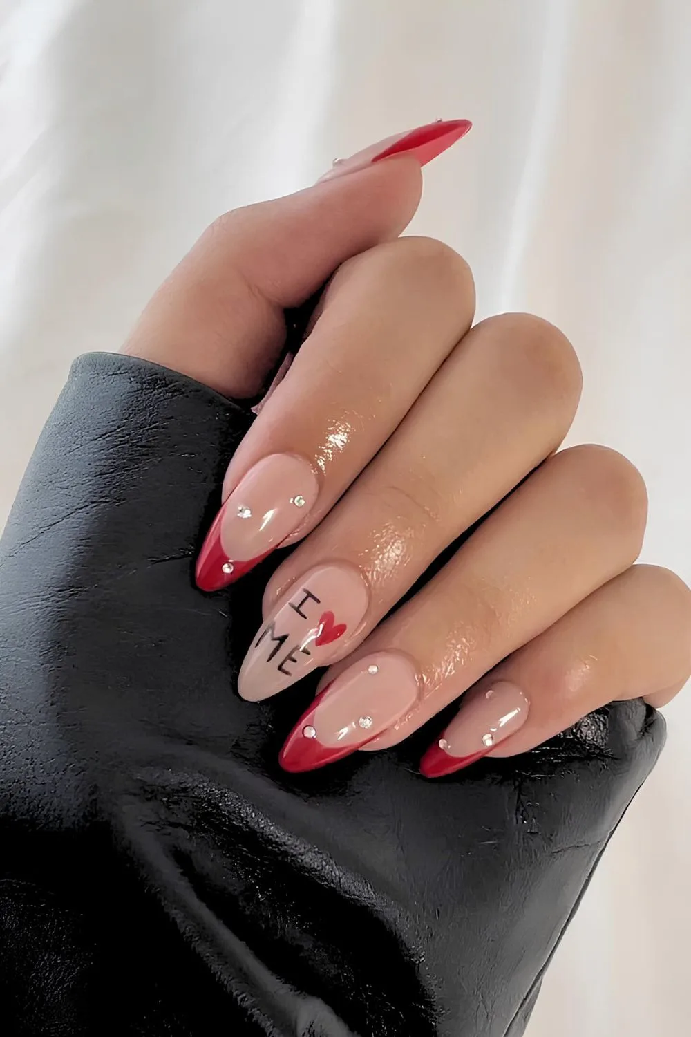 Red French nails with Valentine art