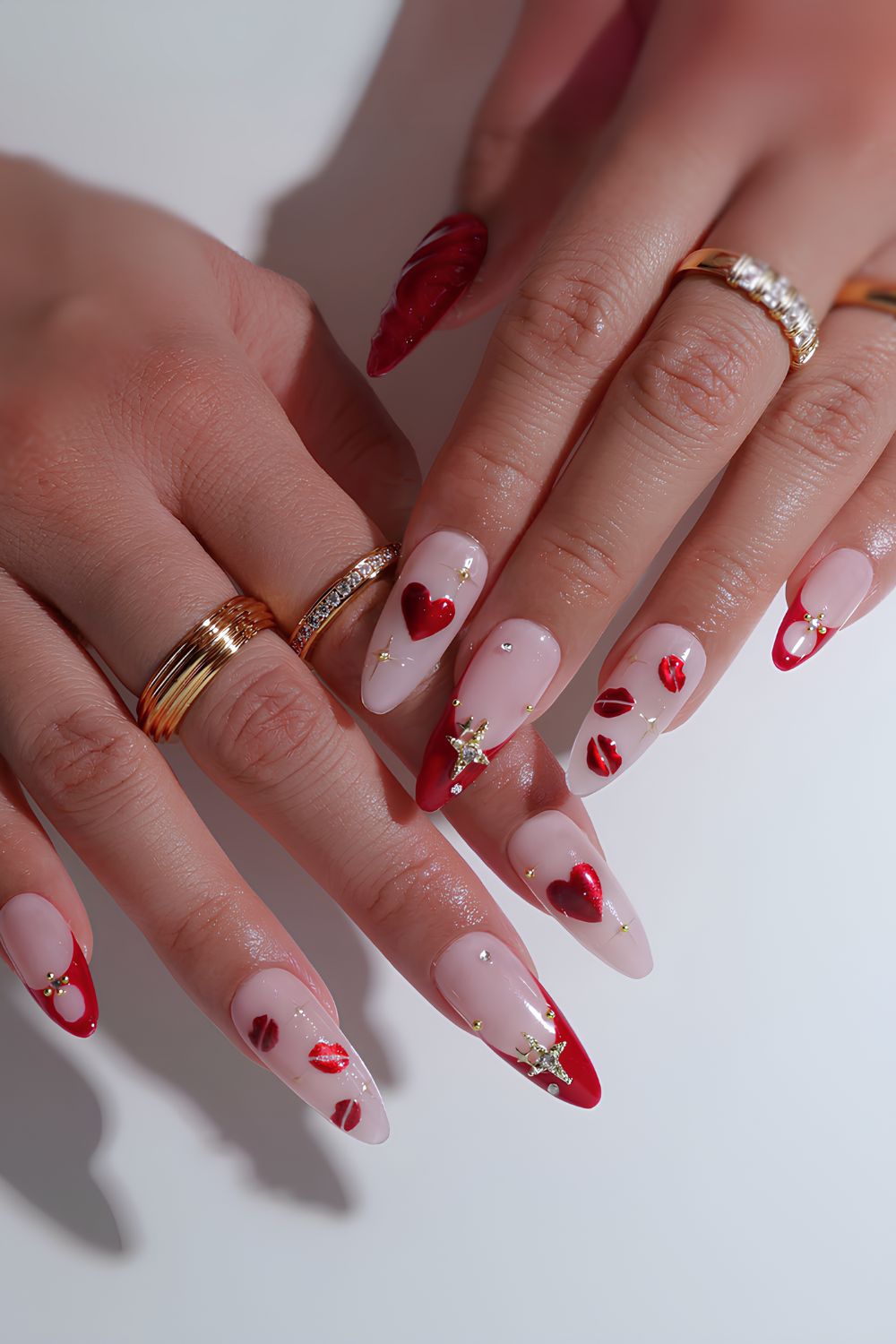 Red and gold mix and match Valentine nails