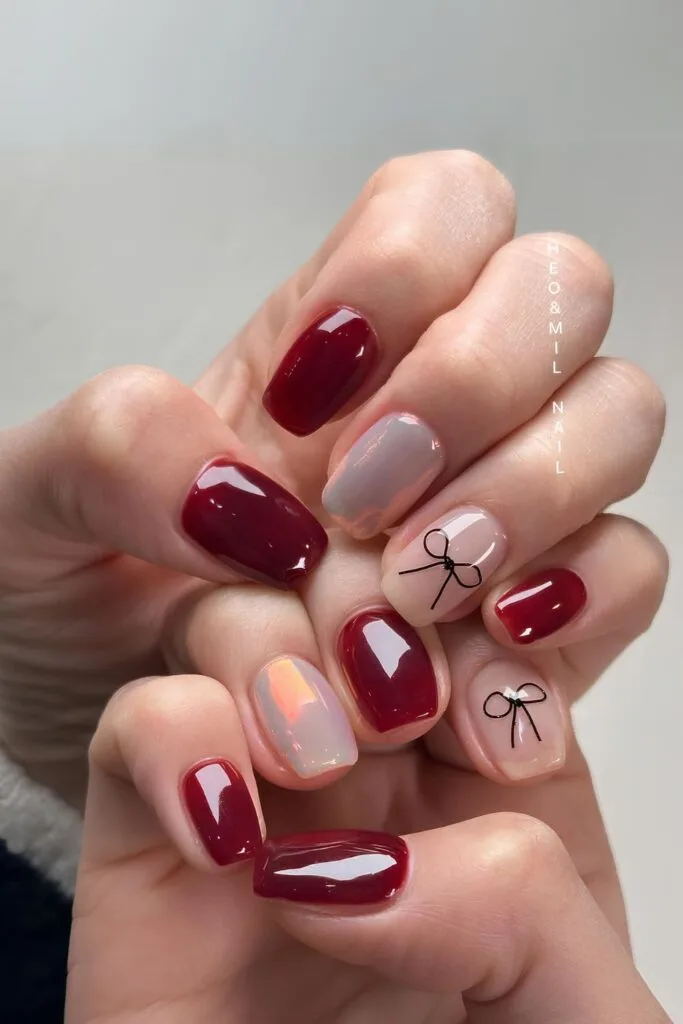 Red and white chrome mani with bows