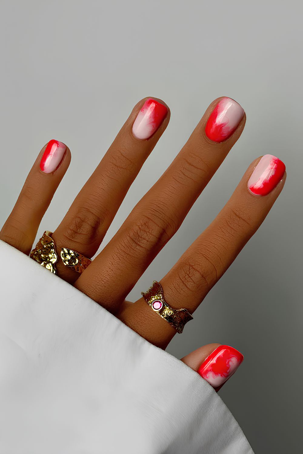 Red and white marble nails