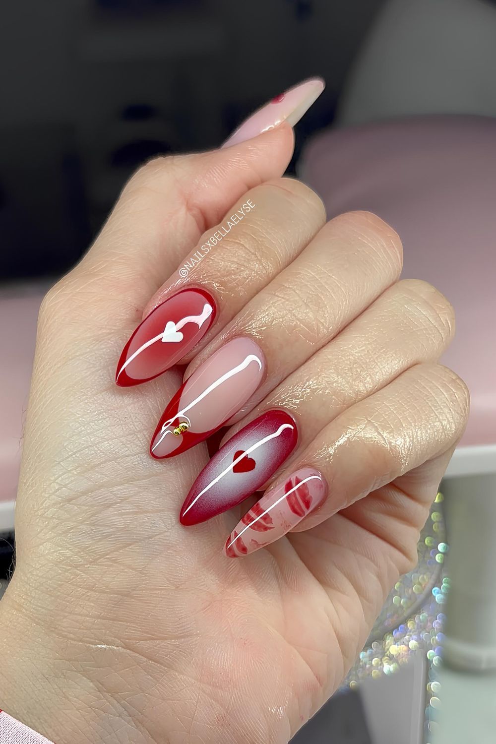 Red aura nails with hearts and kisses motives