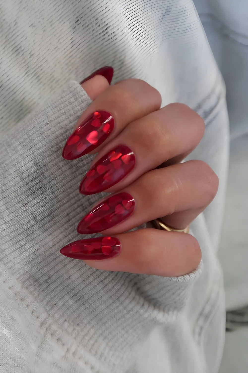 Red jelly nails with heart accents