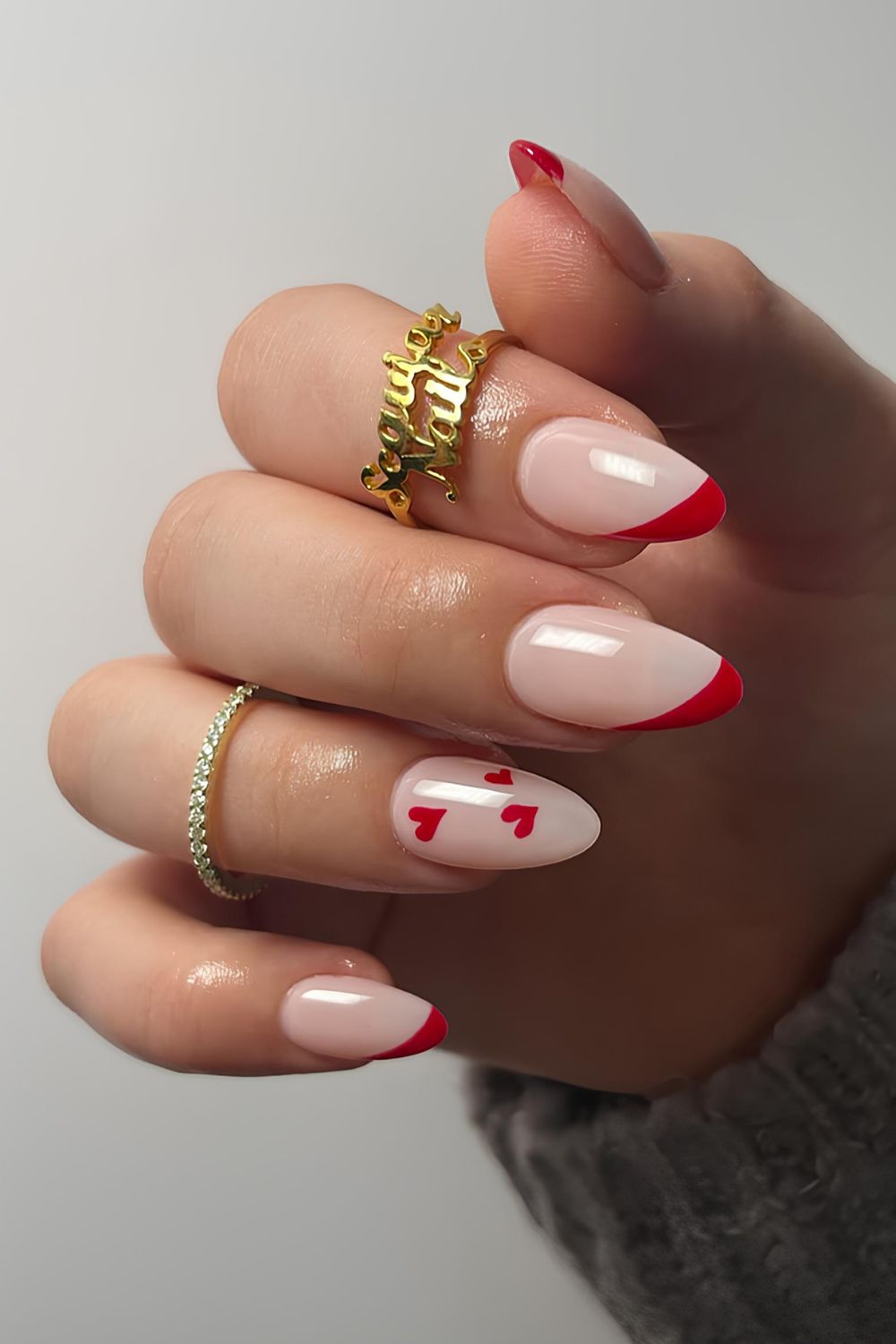 Red side French tip nails with hearts