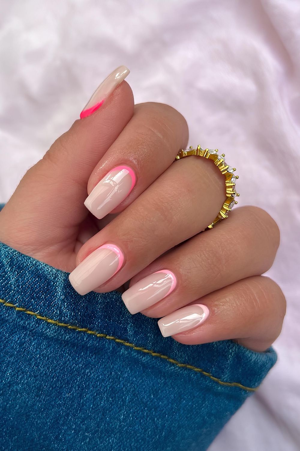 Reverse French tip nails in pink color