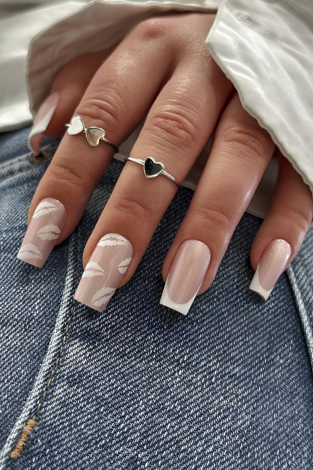 Rose gold pearl nails with white tips and white lip print designs