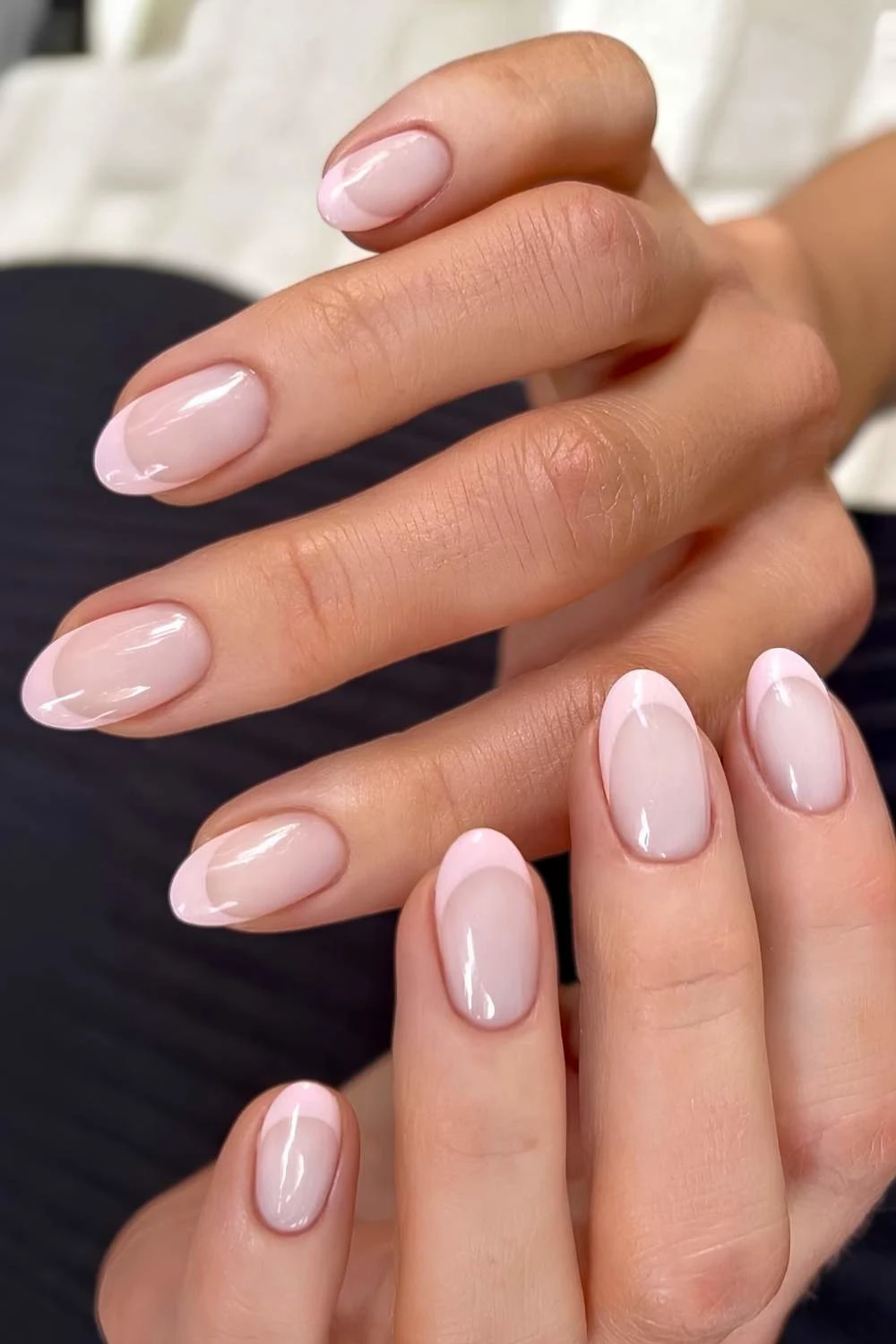 Round pink French tip nails