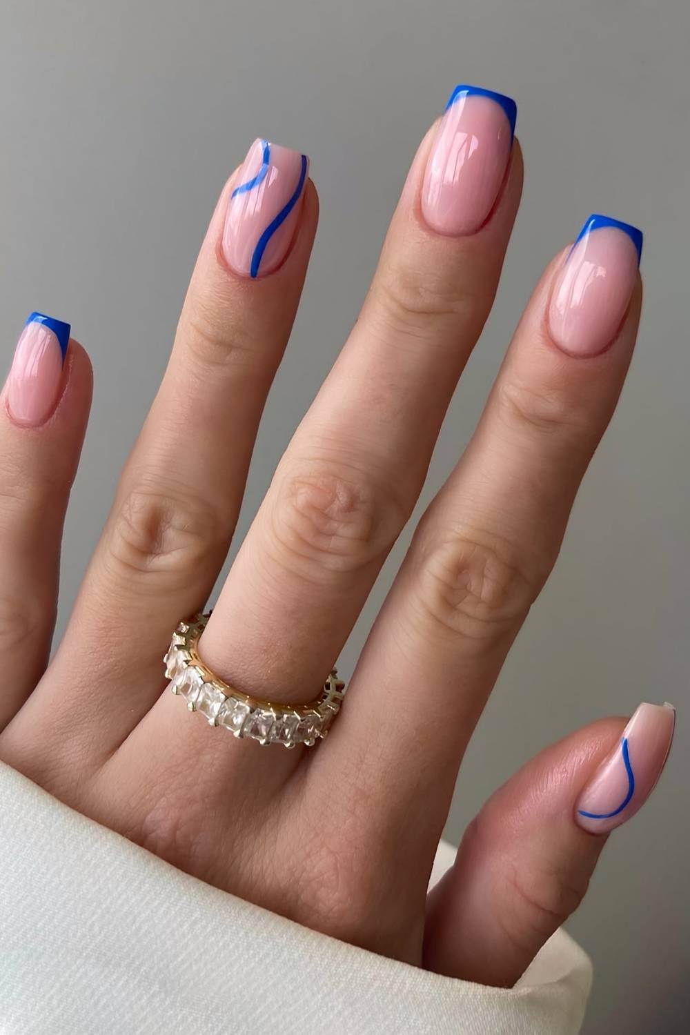 Royal blue French nails with line art