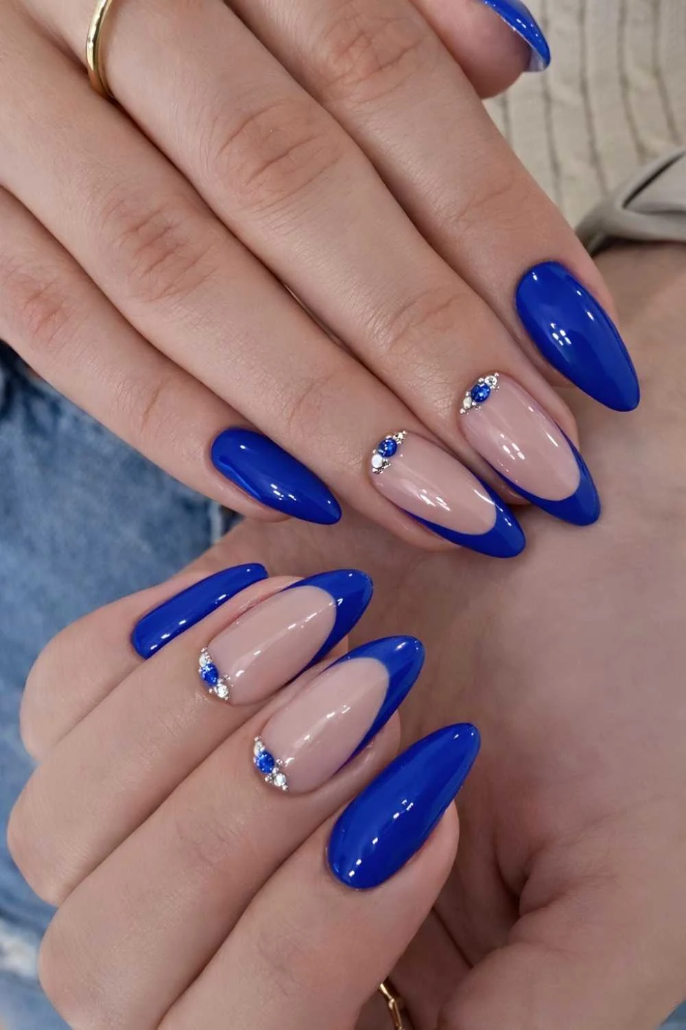 Royal blue nails with accent gems