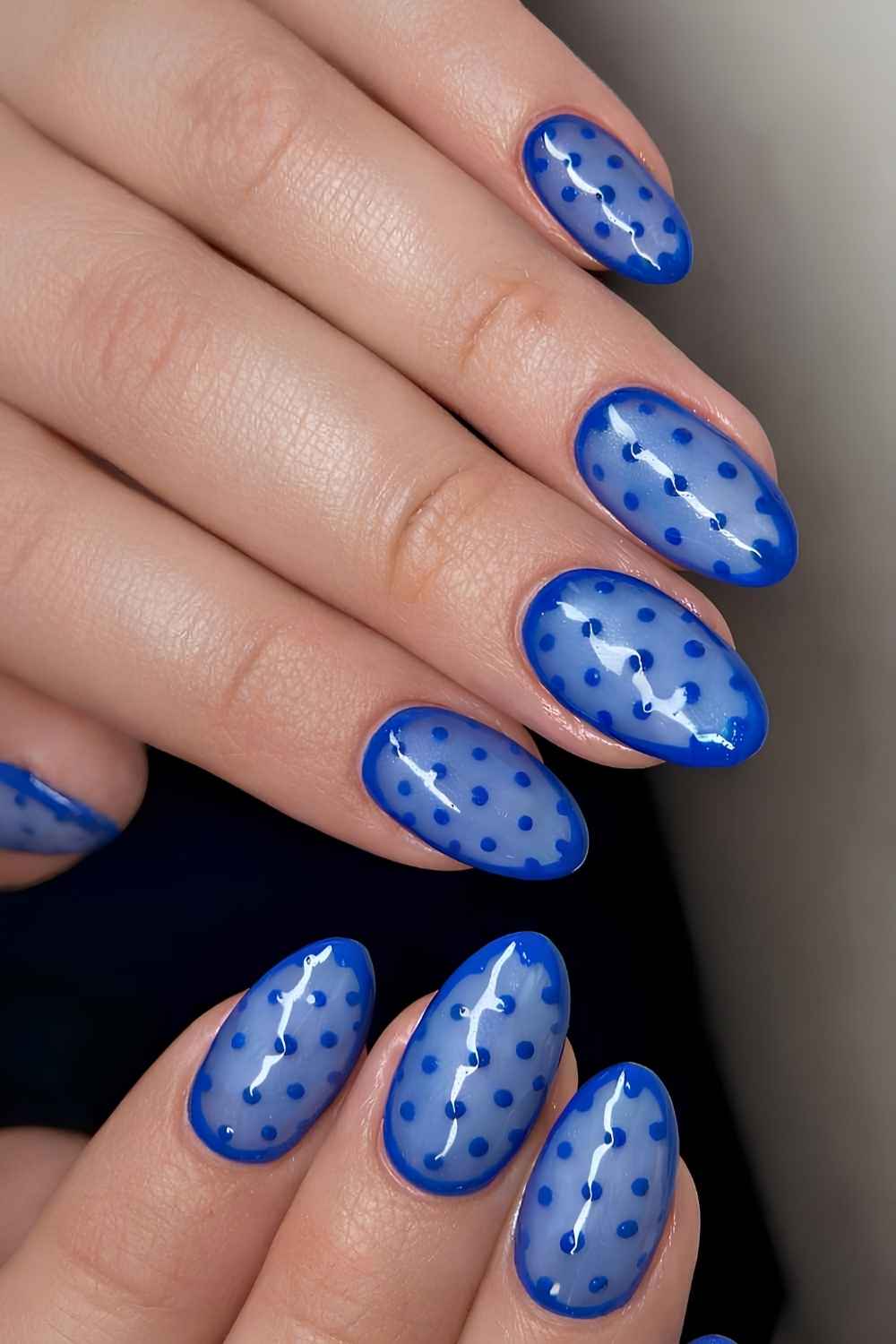 Royal blue polka dot nails