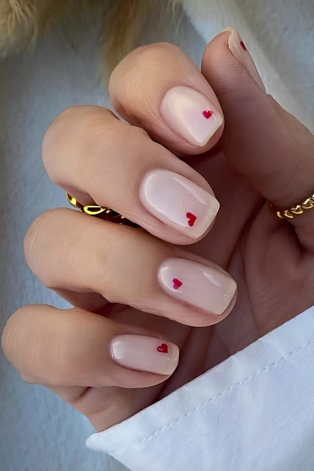 Sheer milky mani with red hearts