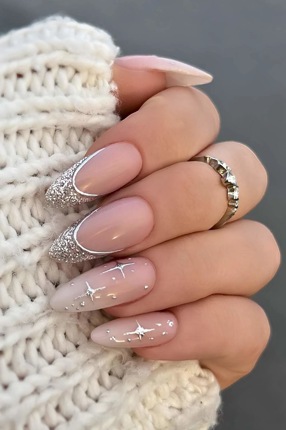 Silver glitter French manicure with starry art