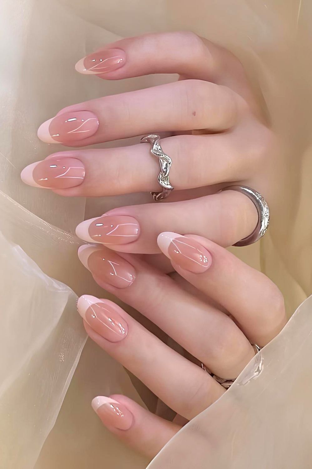 Soft pink ombre French tip nails