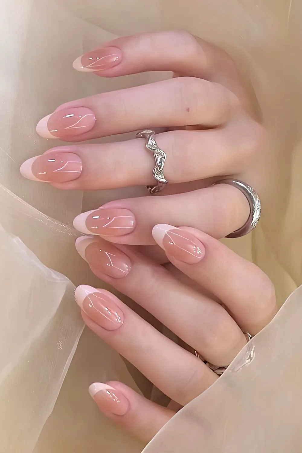 Soft pink ombre French tip nails